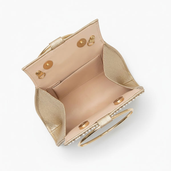 Celestia Rhinestone Crystal Evening Bag in gold, top view of interior with magnetic snap closures and slip pocket