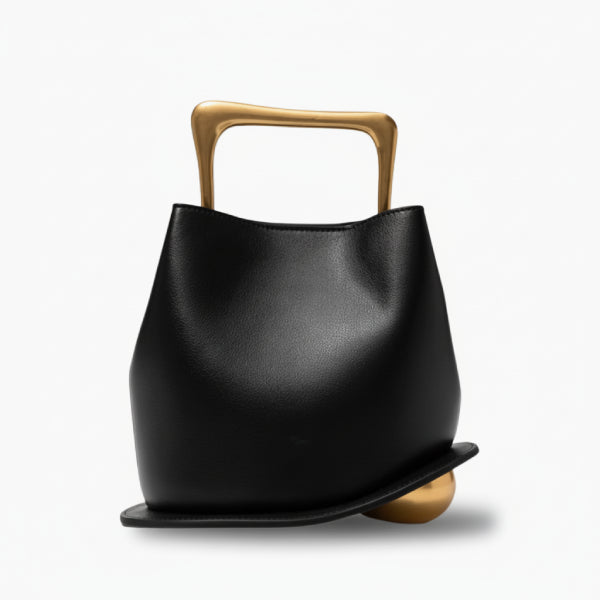 Izelia Genuine Leather Crossbody Bag in black, front studio view showcasing minimalist curved silhouette with bold gold top handle