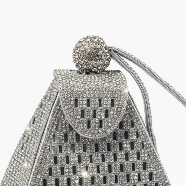 Liora Handmade Crystal Acrylic Evening Bag in silver, closeup highlighting sparkling rhinestones, rounded beaded clasp, and wrist strap