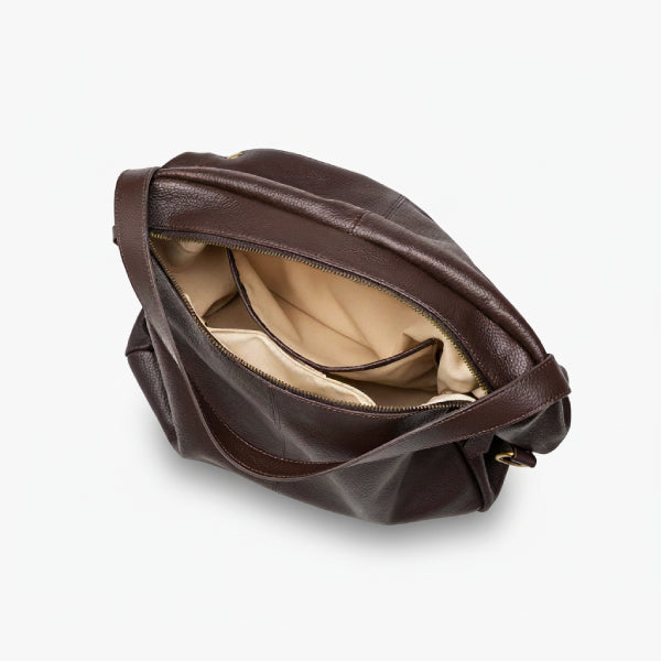Interior view of the Lunara genuine leather shoulder bag in brown, highlighting the spacious compartments and soft lining