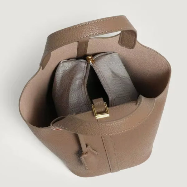 Lunelia Vegan Leather Bucket Bag in brown, top view of interior with removable zip pouch and central strap closure