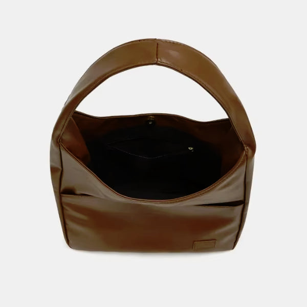 Interior view of Seliora vegan leather shoulder bag in coffee color with spacious compartment