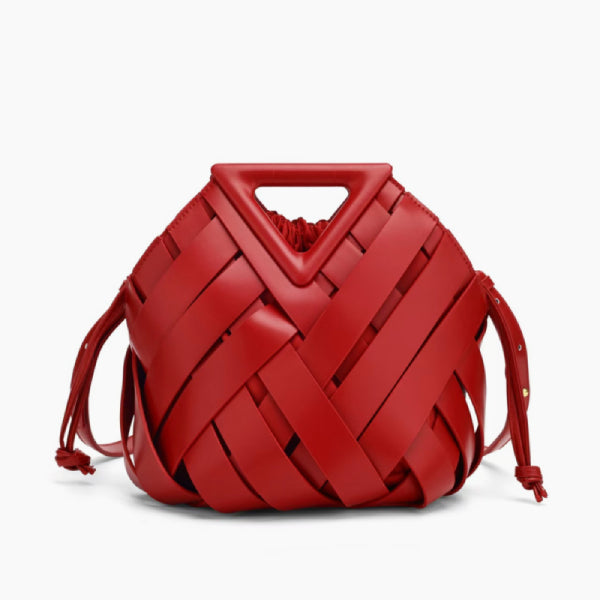 Seren Vegan Leather Bucket Bag in red, front studio view showing sculptural woven body with drawstring sides and triangle handle