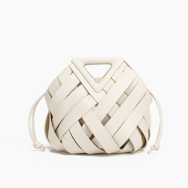 Seren Vegan Leather Bucket Bag in white, front studio view showing sculptural woven body with drawstring sides and triangle handle
