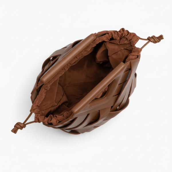Seren Vegan Leather Bucket Bag in brown, top view of interior featuring drawstring fabric pouch and open compartment