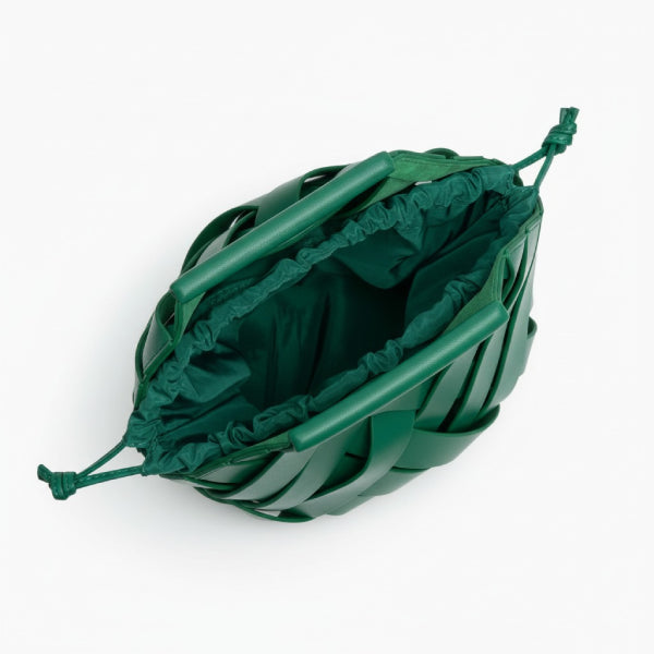 Seren Vegan Leather Bucket Bag in green, top view of interior with drawstring fabric pouch and open compartment