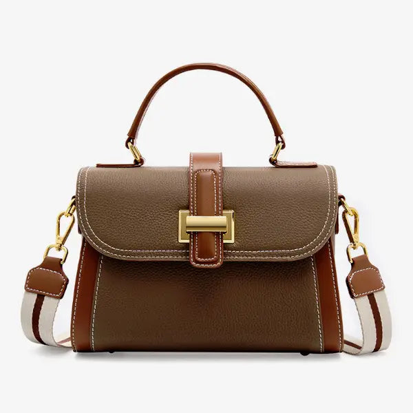 Front view of the brown genuine leather satchel bag featuring gold hardware and a stylish, structured design