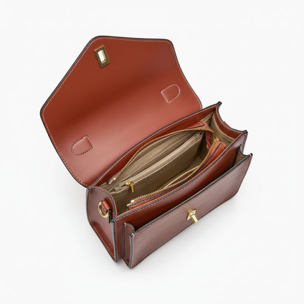 Interior view of the brown genuine leather satchel bag, featuring multiple compartments and a soft lining for easy organization