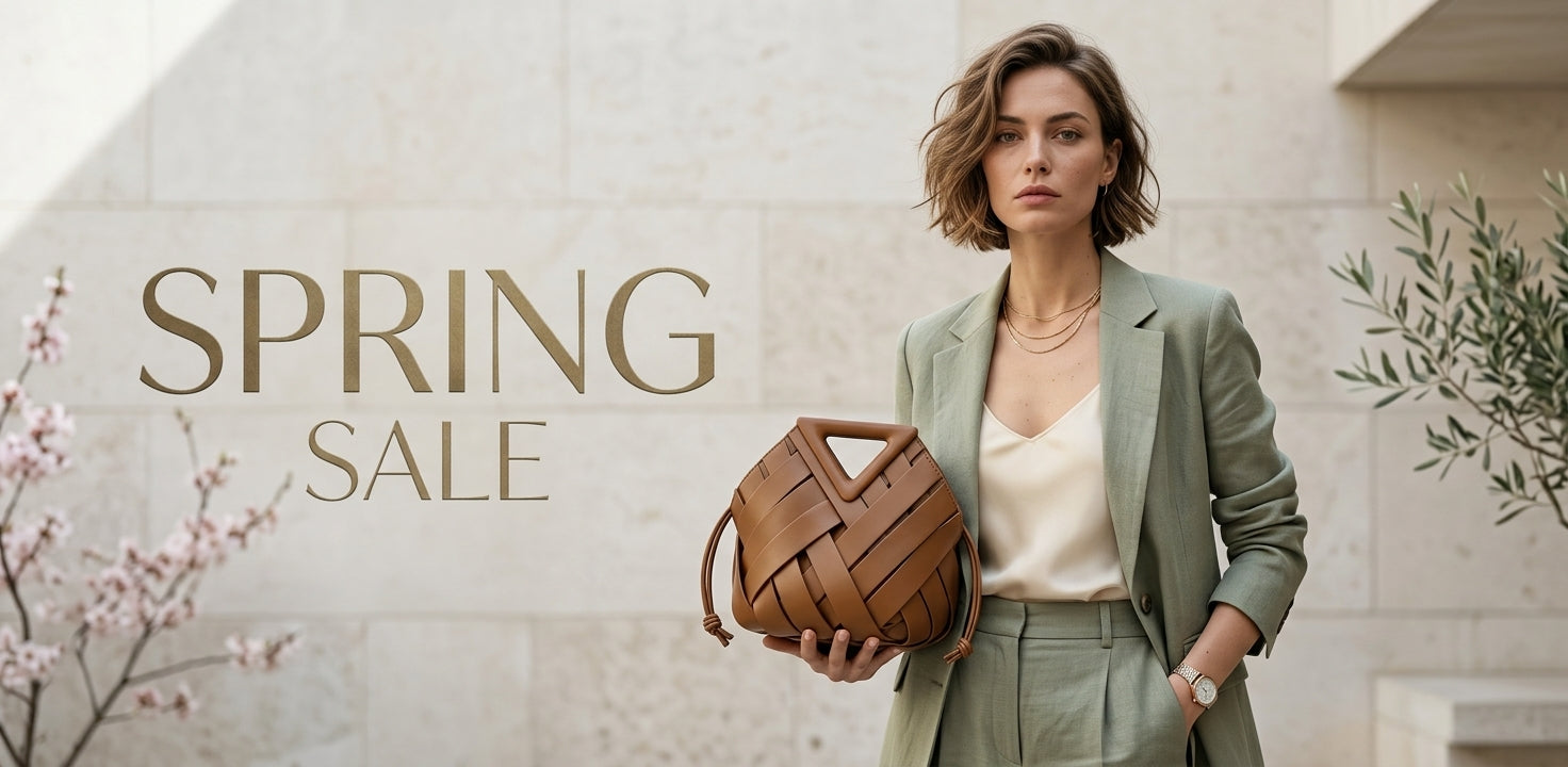 Woman holding a woven handbag with 'Spring Sale' text on a light background