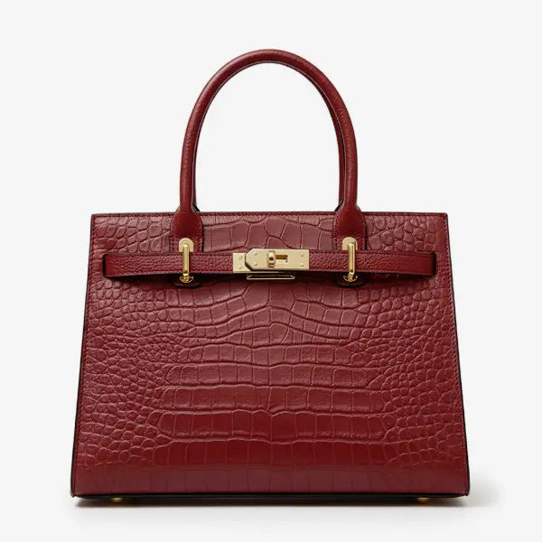 Front view of Adara genuine leather wine red satchel bag featuring crocodile texture and gold clasp accents