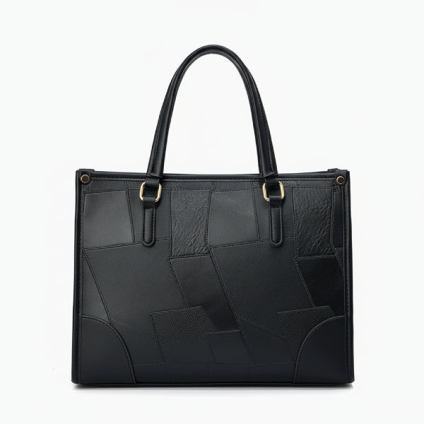 Front view of the Anelisse vegan leather tote bag in black with a modern, geometric pattern and elegant design