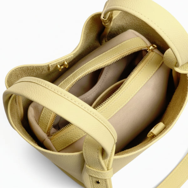 Arden Genuine Leather Bucket Bag in off-yellow, top view of interior with removable zip pouch and organized compartments