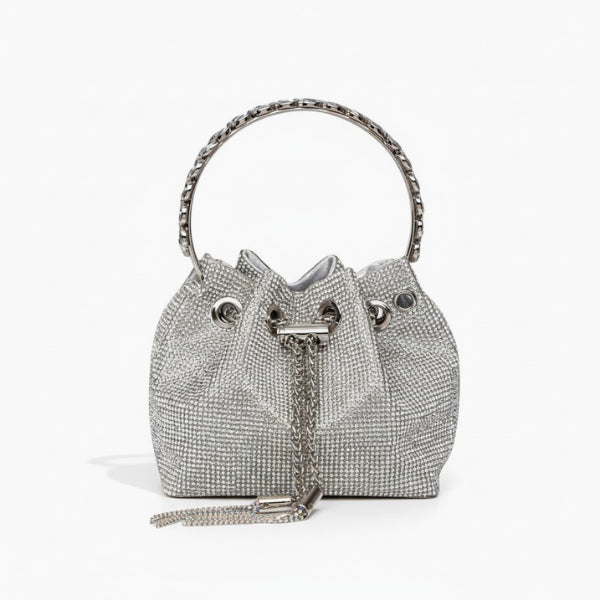 Aveline Rhinestone Crystal Evening Bag in silver, front studio view with circular metal handle and sparkling crystal exterior