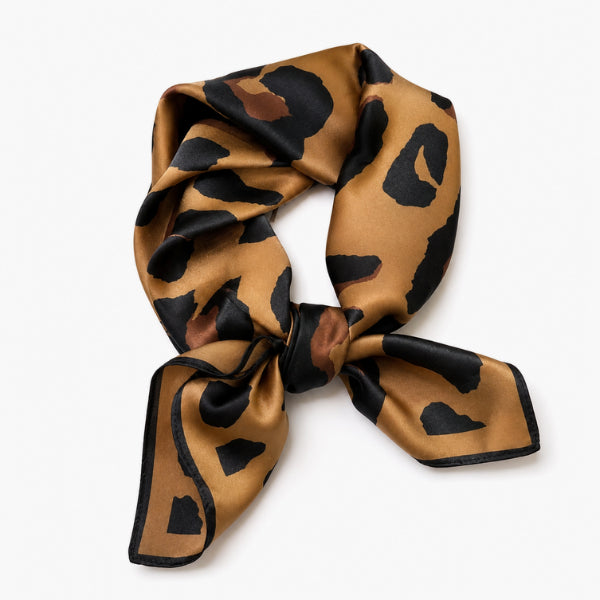 Leopard print scarf on a white background