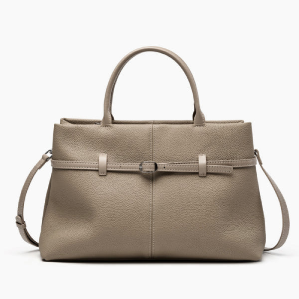 Front view of a khaki genuine leather tote bag featuring a simple yet sophisticated design with a central buckle accent
