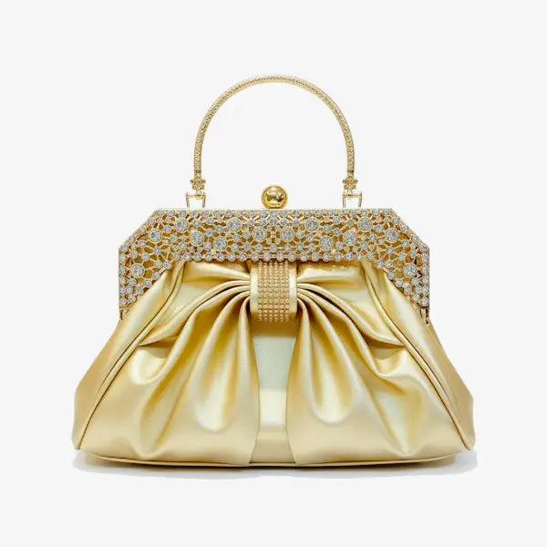 Front view of a gold vegan leather evening bag with intricate rhinestone-studded frame and elegant pleated design