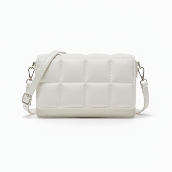 Isla Vegan Leather Crossbody Bag in white, front studio view showcasing quilted square panel design and adjustable crossbody strap