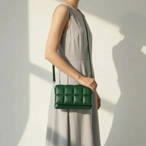 Isla Vegan Leather Crossbody Bag in green, lifestyle model shot wearing the compact quilted bag crossbody for everyday style