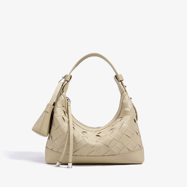 Front view of Ismara genuine leather woven hobo bag in beige, with a modern, stylish look and woven texture detail