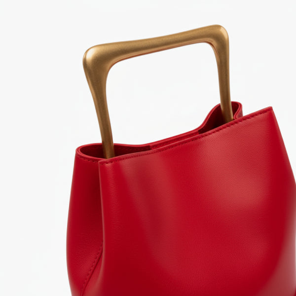 Izelia Genuine Leather Crossbody Bag in red, closeup highlighting smooth leather and sculptural square gold handle