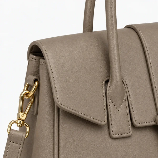 Lévoria Genuine Leather Satchel Bag in gray, close-up with gold-tone hardware, showing the flap, handles
