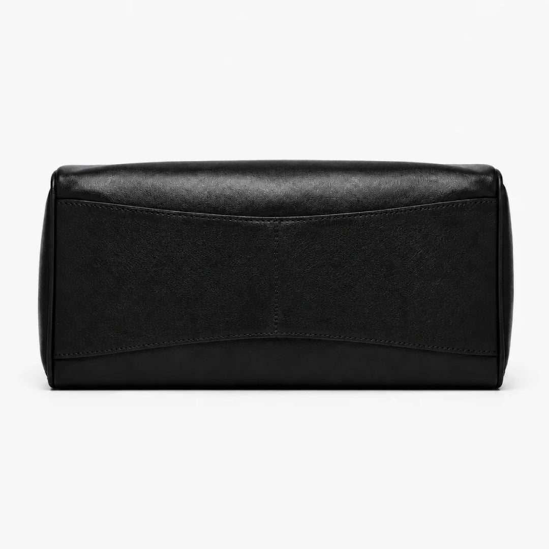 A black faux leather clutch bag with a curved top and a central seam, shown from the front on a plain white background.