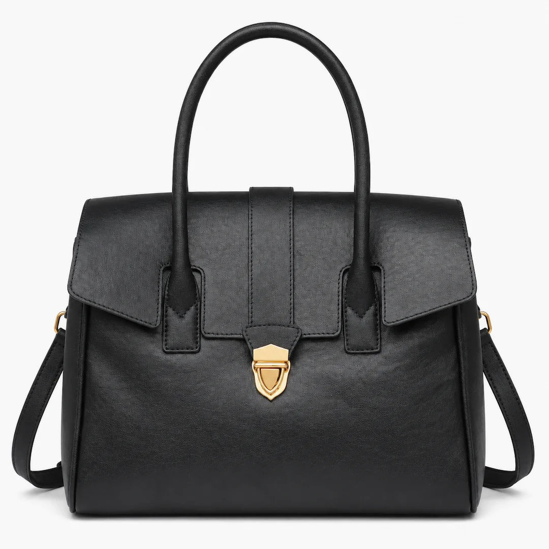 A structured black leather handbag with dual top handles, a front flap, and a gold-tone shield-shaped clasp, shown on a plain white background.