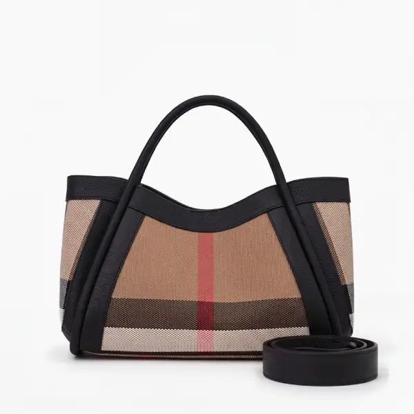 Checkered handbag with black strap on a white background