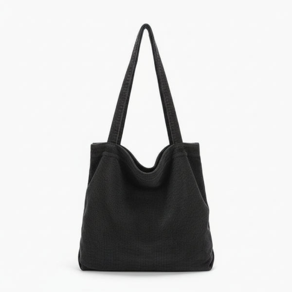 Front view of the Marinda corduroy tote bag in black with a simple and sleek design