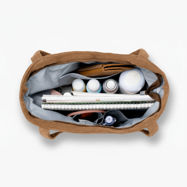 Interior view of the Marinda corduroy tote bag in brown showing the spacious interior and soft lining