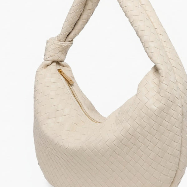 Maris Vegan Leather Hobo Bag in off-white, woven texture close-up with knotted handle and gold zipper