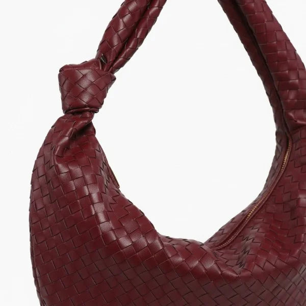 Maris Vegan Leather Hobo Bag in wine red, woven texture close-up with knotted handle and gold zipper