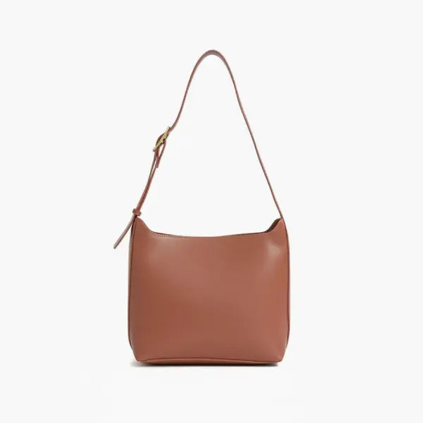 Front view of brown vegan leather shoulder bag with a simple, clean design and gold buckle