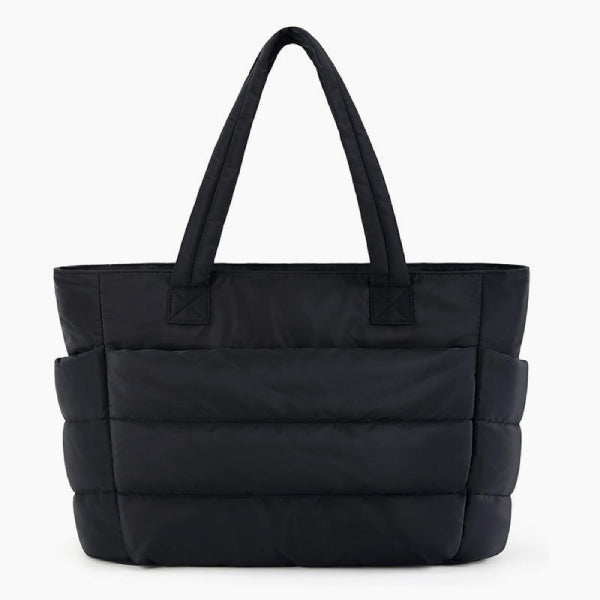 Front view of black puffer-style tote bag featuring quilted texture and strong, comfortable handles