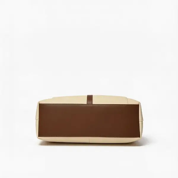 A structured leather handbag shown from the back, featuring a dark brown panel and light beige side panels on a clean white background.