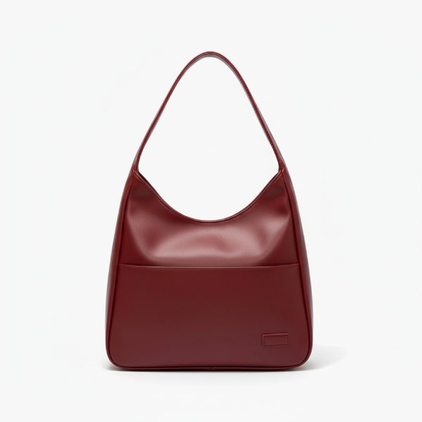Front view of Seliora vegan leather shoulder bag in wine red color with minimalist design and front pocket