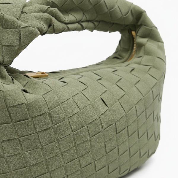 Seraphine Vegan Leather Hobo Bag in green, close-up of matte woven texture with knotted top handle and gold zipper