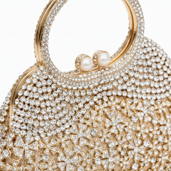 Close-up of serenna rhinestone evening bag featuring intricate rhinestone design and pearl clasp
