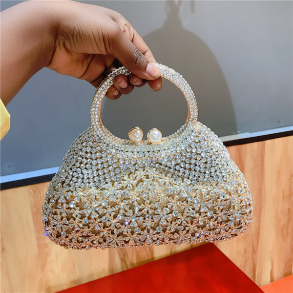 Handheld serenna rhinestone evening bag with gold and clear rhinestones and pearl clasp