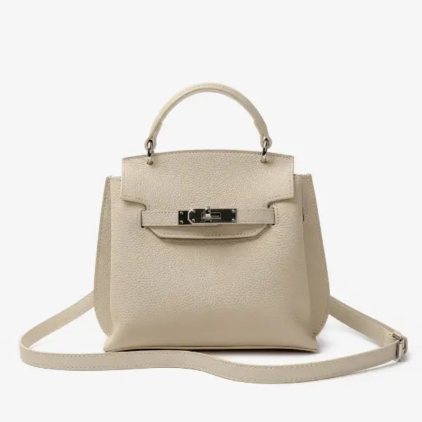 Front view of the off-white genuine leather satchel bag with silver hardware, offering a sleek and sophisticated design perfect for daily use