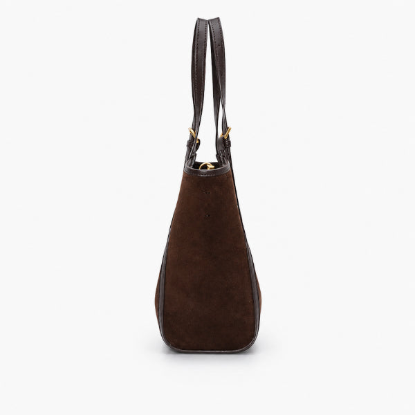 A dark brown suede shoulder bag with dark brown leather trim and gold-tone hardware, shown from the back on a light gray background.