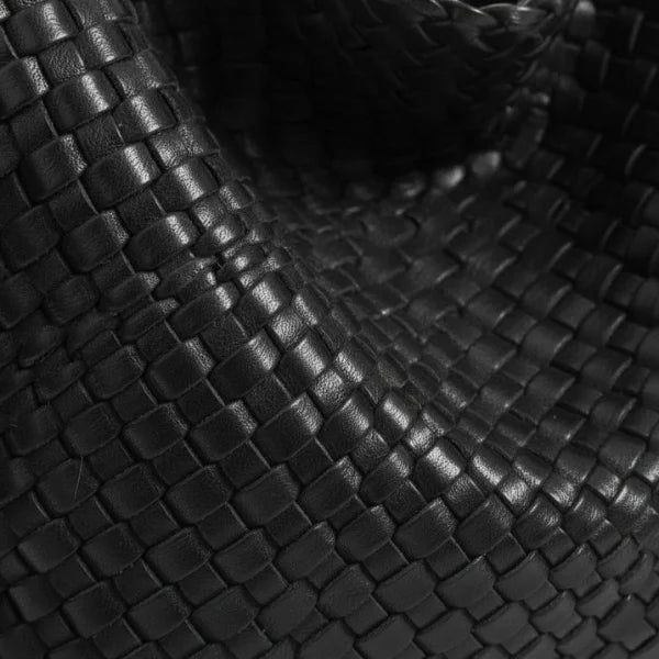 Soraya Vegan Leather Hobo Bag in black, close-up of glossy woven texture showing premium basketweave detail