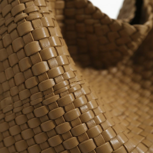 Soraya Vegan Leather Hobo Bag in brown, close-up of glossy woven texture showing premium basketweave detail