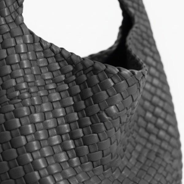 Soraya Vegan Leather Hobo Bag in dark grey, close-up of glossy woven texture showing premium basketweave detail