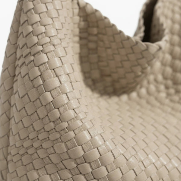 Soraya Vegan Leather Hobo Bag in off-white, close-up of glossy woven texture highlighting premium basketweave detail