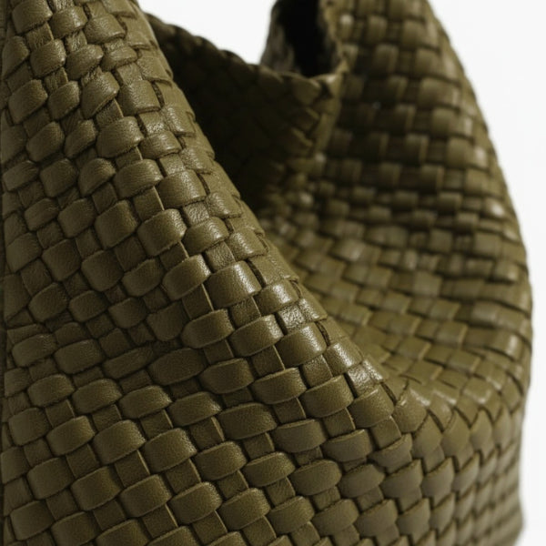 Soraya Vegan Leather Hobo Bag in olive green, close-up of glossy woven texture showing premium basketweave detail