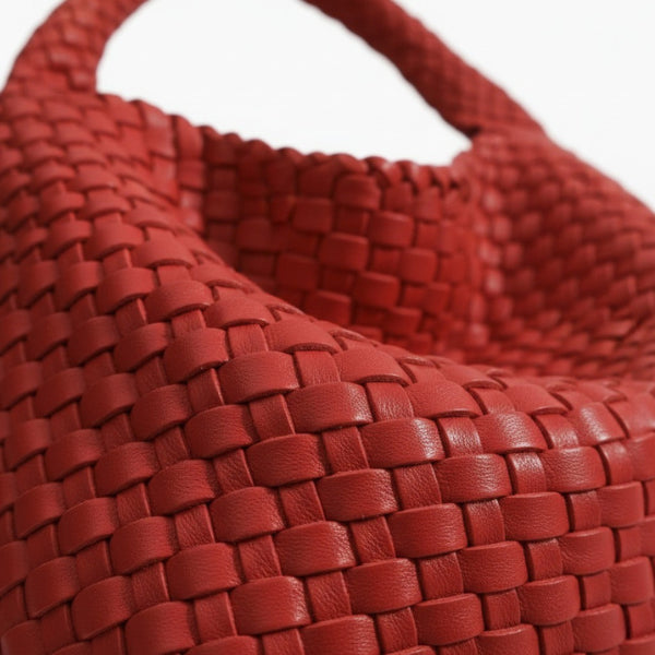 Soraya Vegan Leather Hobo Bag in olive red, close-up of glossy woven texture highlighting premium basketweave detail