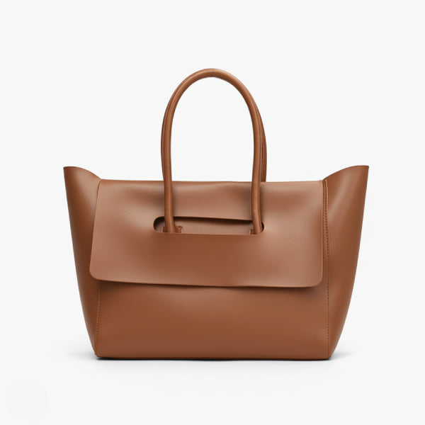 Front view of Sylvene vegan leather tote bag in a rich caramel color, showcasing its sleek and modern design