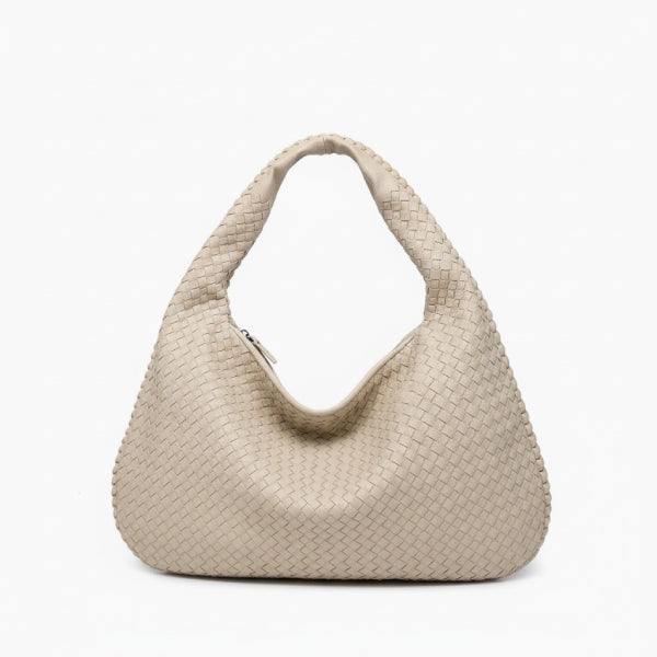 Front view of off-white woven vegan leather hobo bag with wide handle and zipper opening