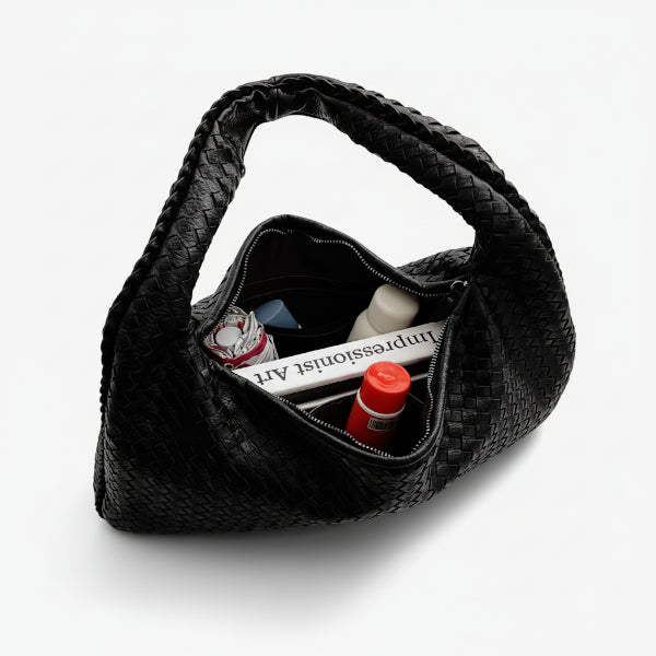Valencia Vegan Leather Hobo Bag in black, top view showing wide zip opening and roomy interior with essentials inside